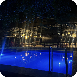 Swimming pool lit up at night