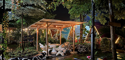 Wooden pavilion among the trees