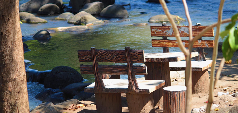 Chairs by the riverside